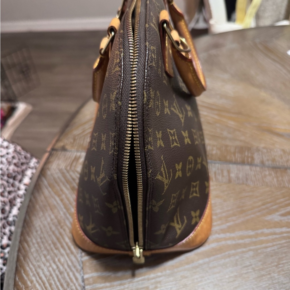Louis Vuitton Brown Monogram Alma Satchel with Tan Leather Trim - Picture 2 of 3